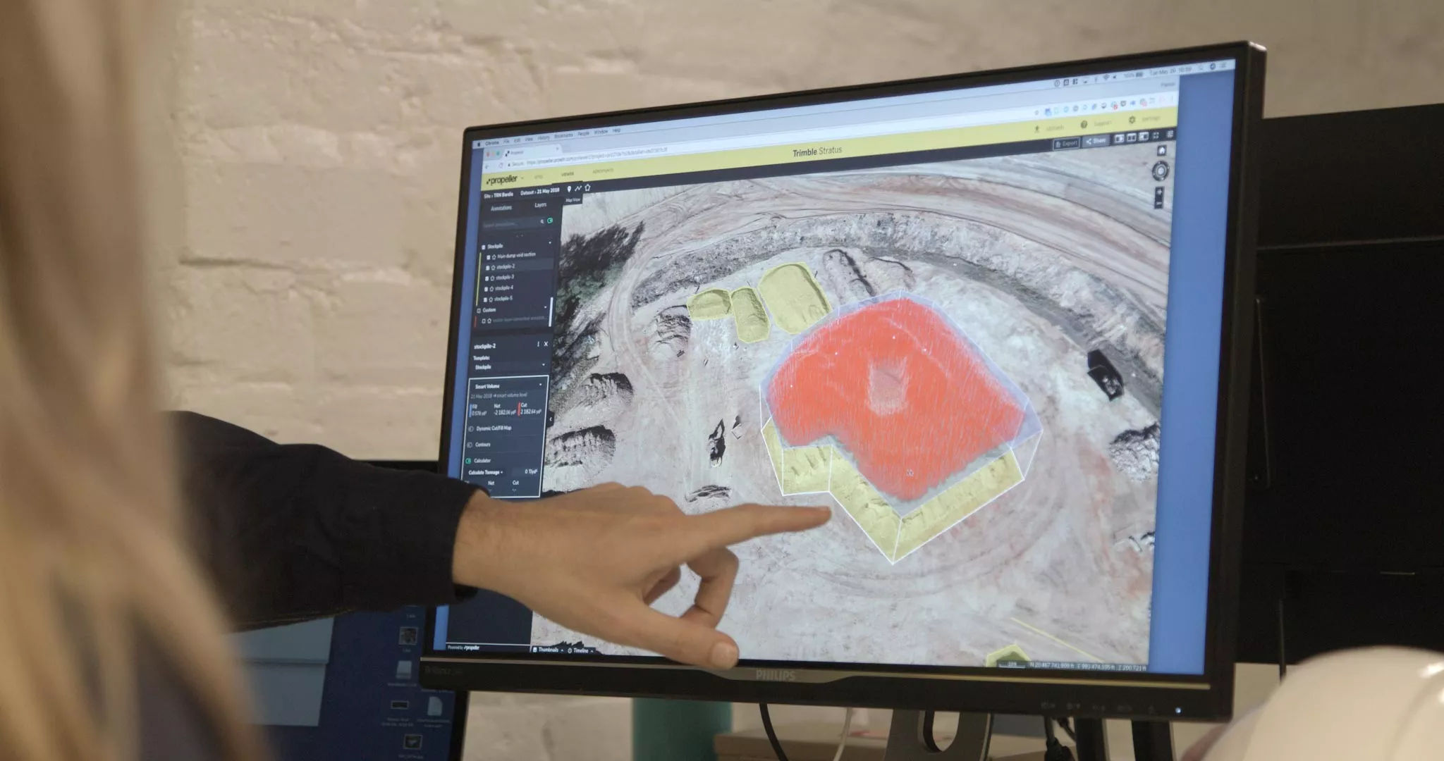 quarry managers collaborate using drone data