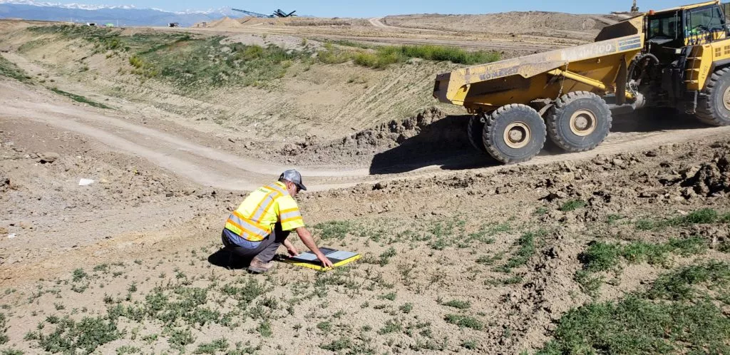 surveyor setting out ground control point