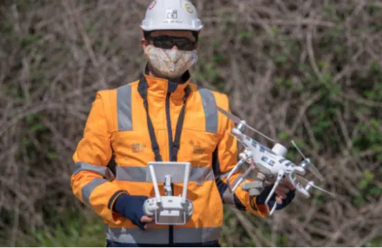 a person holding a drone