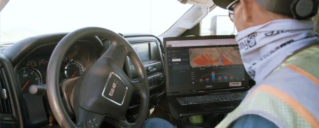 Contractor viewing 3D map produced by Propeller Aero on a laptop