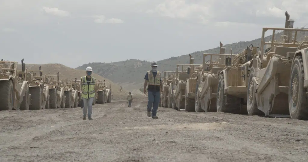 workers near construction equipment